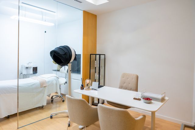 Consultation suite with glazed treatment-room partition