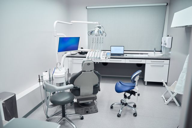 Dental treatment room with fitted clinical cabinetry and task lighting