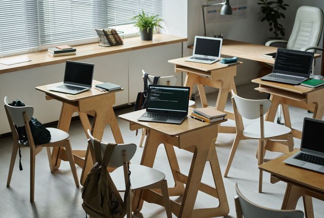 IT teaching room with individual timber desks