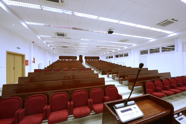 University lecture theatre with tiered seating and integrated lighting