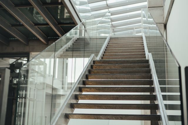 University staircase with glazed balustrades and a naturally lit atrium