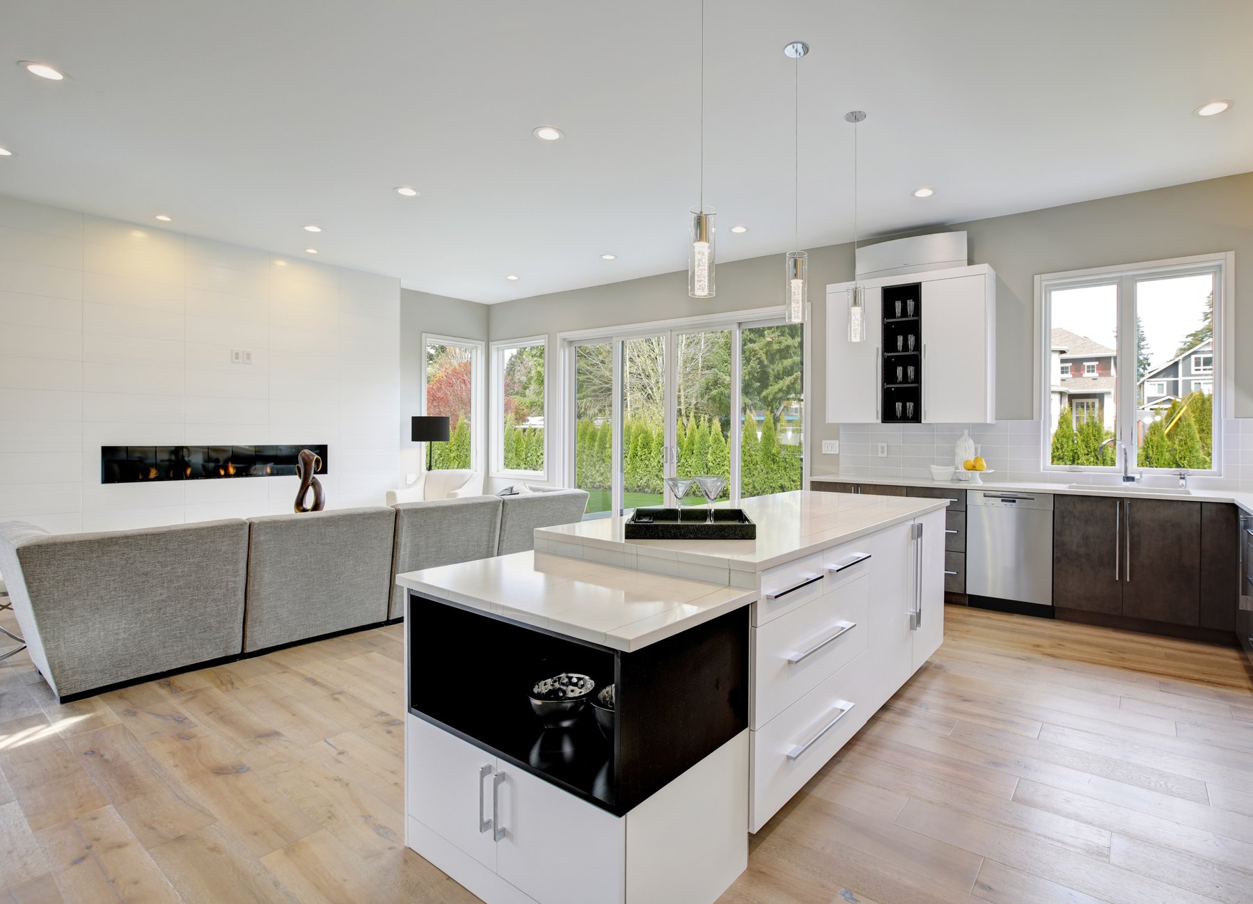 Bright open-plan home with a generous island kitchen and garden-facing windows.